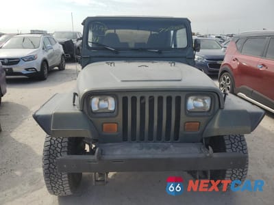 Piąte zdjęcie samochodu w środku: 1988 JEEP WRANGLER SAHARA VIN:2BCCV81M6JB511213 - miniatura