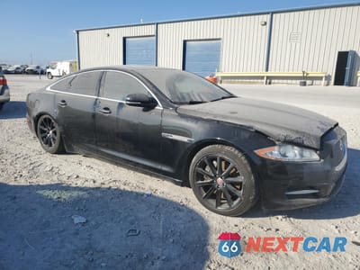 Czwarte zdjęcie samochodu z boku: 2014 JAGUAR XJ VIN:SAJWA1CZ1E8V65570 - miniatura