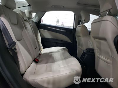 Zdjęcie 10 z 14 samochodu: 2015 FORD FUSION TITANIUM HEV VIN:3FA6P0RU9FR120342 - miniatura