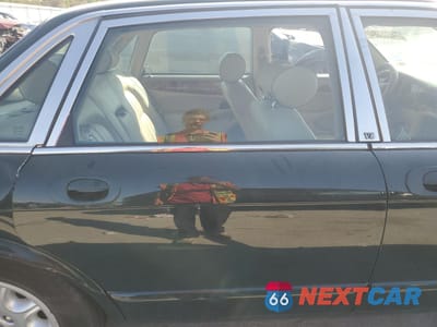 Zdjęcie 10 z 13 samochodu: 2003 JAGUAR XJ8 VIN:SAJDA14C93LF51043 - miniatura