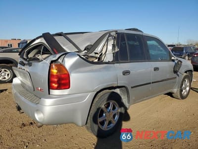 Trzecie zdjęcie samochodu z tyłu: 2009 GMC ENVOY SLE VIN:1GKDT33S892102580 - miniatura