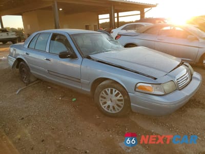 Czwarte zdjęcie samochodu z boku: 2004 FORD CROWN VICTORIA LX VIN:2FAHP74W84X151316 - miniatura