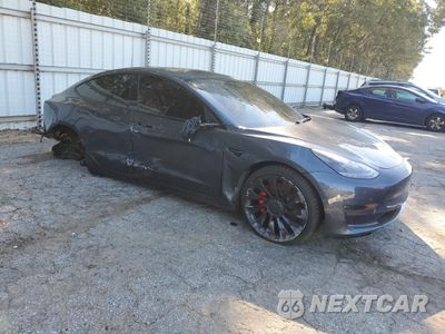 Czwarte zdjęcie samochodu z boku: 2023 TESLA MODEL 3 VIN:5YJ3E1EC5PF583765 - miniatura