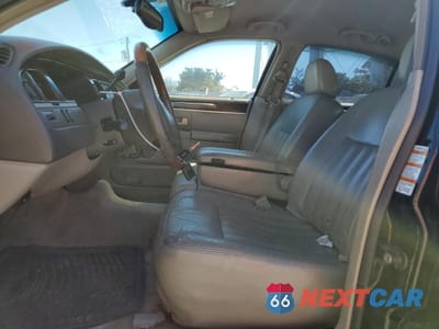 Zdjęcie 7 z 13 samochodu: 2003 LINCOLN TOWN CAR SIGNATURE VIN:1LNHM82W13Y703695 - miniatura
