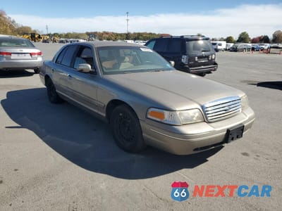 Czwarte zdjęcie samochodu z boku: 2002 FORD CROWN VICTORIA VIN:2FAFP73WX2X109672 - miniatura