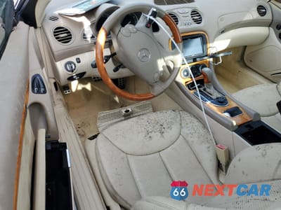 Zdjęcie 8 z 13 samochodu: 2004 MERCEDES-BENZ SL 500 VIN:WDBSK75F44F069123 - miniatura