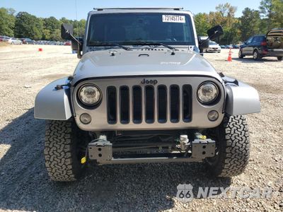 Piąte zdjęcie samochodu w środku: 2017 JEEP WRANGLER UNLIMITED SAHARA VIN:1C4BJWEG0HL603314 - miniatura
