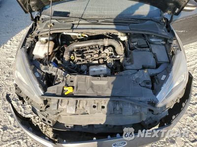 Zdjęcie 12 z 14 samochodu: 2017 FORD FOCUS SE VIN:1FADP3FEXHL342881 - miniatura
