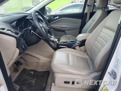 Zdjęcie 7 z 12 samochodu: 2014 FORD ESCAPE TITANIUM VIN:1FMCU0J96EUD50274 - miniatura