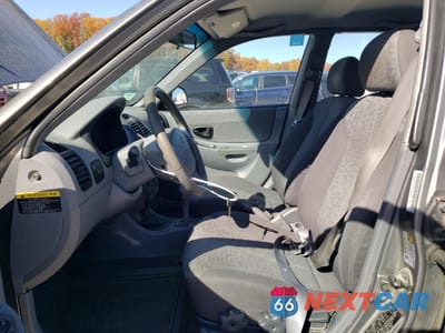 Zdjęcie 7 z 12 samochodu: 2005 HYUNDAI ACCENT GL VIN:KMHCG45C75U595637 - miniatura