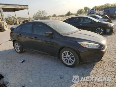 Czwarte zdjęcie samochodu z boku: 2017 FORD FOCUS SE VIN:1FADP3F20HL254380 - miniatura