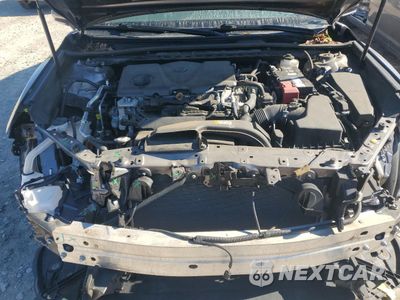 Zdjęcie 11 z 12 samochodu: 2019 TOYOTA CAMRY L VIN:4T1B11HK0KU692947 - miniatura