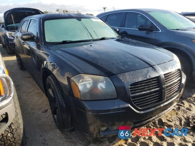 Czwarte zdjęcie samochodu z boku: 2005 DODGE MAGNUM R/T VIN:2D8GV58245H670884 - miniatura