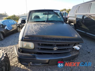 Piąte zdjęcie samochodu w środku: 1994 MAZDA B2300 VIN:4F4CR12A4RTM61672 - miniatura