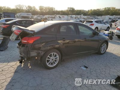 Trzecie zdjęcie samochodu z tyłu: 2017 FORD FOCUS SE VIN:1FADP3F20HL254380 - miniatura