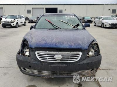 Piąte zdjęcie samochodu w środku: 2007 KIA OPTIMA LX VIN:KNAGE123175111759 - miniatura