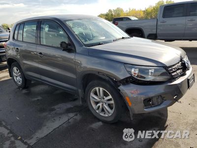 Czwarte zdjęcie samochodu z boku: 2014 VOLKSWAGEN TIGUAN S VIN:WVGBV3AXXEW518818 - miniatura