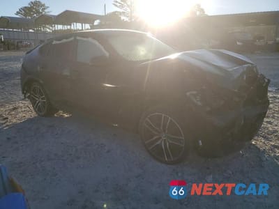 Czwarte zdjęcie samochodu z boku: 2022 BMW X6 XDRIVE40I VIN:5UXCY6C09N9L63726 - miniatura