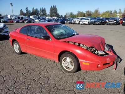 Czwarte zdjęcie samochodu z boku: 2004 PONTIAC SUNFIRE VIN:1G2JB12F847259309 - miniatura