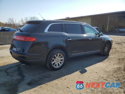 Trzecie zdjęcie samochodu z tyłu: 2015 LINCOLN MKT VIN:2LMHJ5NK1FBL04288 - miniatura