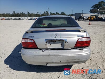 Zdjęcie 6 z 12 samochodu: 2002 MAZDA 626 LX VIN:1YVGF22C125296145 - miniatura