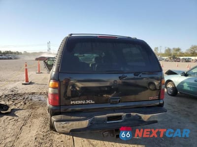 Zdjęcie 6 z 12 samochodu: 2002 GMC YUKON XL K1500 VIN:1GKFK16Z42J161291 - miniatura