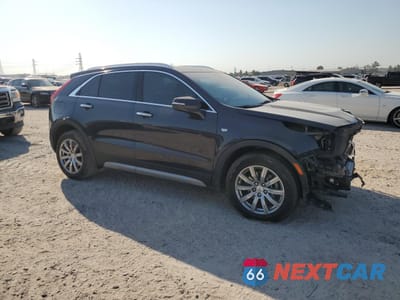 Czwarte zdjęcie samochodu z boku: 2022 CADILLAC XT4 PREMIUM LUXURY VIN:1GYFZCR44NF151123 - miniatura