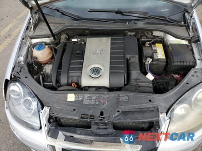 Zdjęcie 11 z 12 samochodu: 2006 VOLKSWAGEN NEW GTI VIN:WVWEV71K36W108439 - miniatura