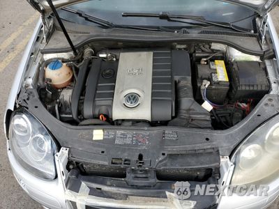 Zdjęcie 11 z 12 samochodu: 2006 VOLKSWAGEN NEW GTI VIN:WVWEV71K36W108439 - miniatura