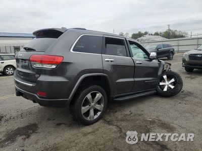 Trzecie zdjęcie samochodu z tyłu: 2014 JEEP GRAND CHEROKEE OVERLAND VIN:1C4RJFCG0EC305679 - miniatura
