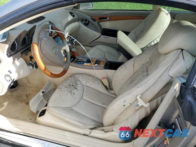 Zdjęcie 7 z 13 samochodu: 2004 MERCEDES-BENZ SL 500 VIN:WDBSK75F44F069123 - miniatura