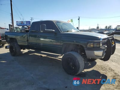 Czwarte zdjęcie samochodu z boku: 1999 DODGE RAM 2500 VIN:3B7KF2365XG171089 - miniatura