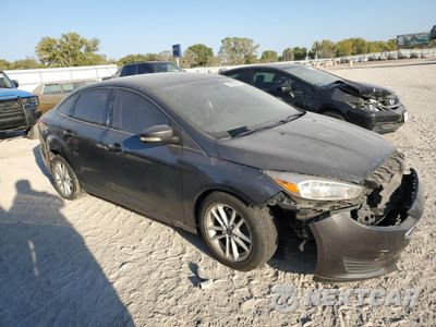Czwarte zdjęcie samochodu z boku: 2017 FORD FOCUS SE VIN:1FADP3FEXHL342881 - miniatura