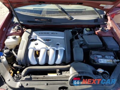 Zdjęcie 12 z 14 samochodu: 2006 KIA OPTIMA LX VIN:KNAGE123565034229 - miniatura