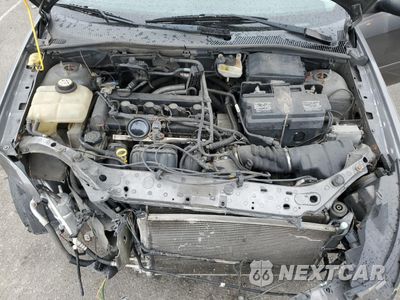 Zdjęcie 13 z 14 samochodu: 2006 FORD FOCUS ZX4 VIN:1FAHP34N96W217984 - miniatura