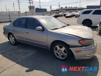 Czwarte zdjęcie samochodu z boku: 2001 INFINITI I30 VIN:JNKCA31AX1T030947 - miniatura