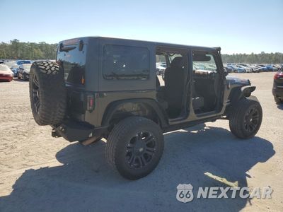 Trzecie zdjęcie samochodu z tyłu: 2014 JEEP WRANGLER UNLIMITED SPORT VIN:1C4BJWDGXEL261156 - miniatura