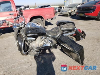 Trzecie zdjęcie samochodu z tyłu: 2006 HONDA VTX1300 R VIN:1HFSC52315A208044 - miniatura