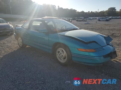 Czwarte zdjęcie samochodu z boku: 1993 SATURN SC2 VIN:1G8ZG1578PZ241755 - miniatura
