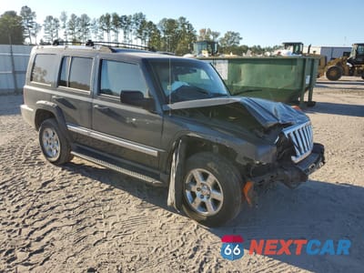 Czwarte zdjęcie samochodu z boku: 2007 JEEP COMMANDER LIMITED VIN:1J8HH58207C585310 - miniatura