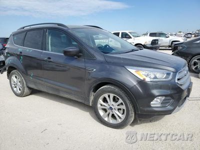 Czwarte zdjęcie samochodu z boku: 2018 FORD ESCAPE SEL VIN:1FMCU0HD5JUD28755 - miniatura