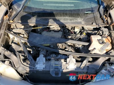 Zdjęcie 12 z 14 samochodu: 2004 PONTIAC MONTANA LUXURY VIN:1GMDX13EX4D152758 - miniatura