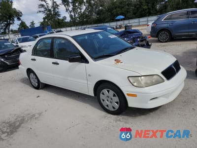 Czwarte zdjęcie samochodu z boku: 2002 MITSUBISHI LANCER ES VIN:JA3AJ26E32U082171 - miniatura