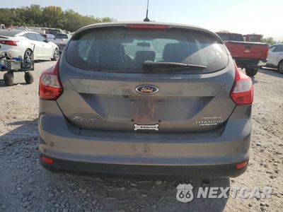 Zdjęcie 6 z 12 samochodu: 2013 FORD FOCUS TITANIUM VIN:1FADP3N21DL106444 - miniatura