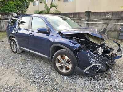 Czwarte zdjęcie samochodu z boku: 2023 HONDA PILOT EXL VIN:5FNYG2H4XPB010046 - miniatura