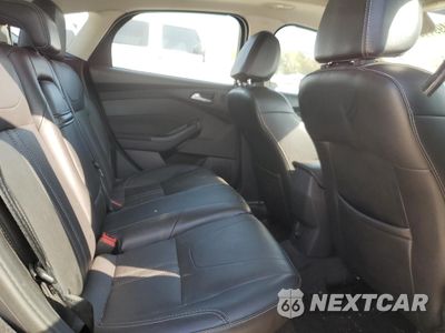 Zdjęcie 10 z 12 samochodu: 2013 FORD FOCUS TITANIUM VIN:1FADP3N21DL106444 - miniatura