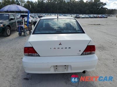 Zdjęcie 6 z 12 samochodu: 2002 MITSUBISHI LANCER ES VIN:JA3AJ26E32U082171 - miniatura