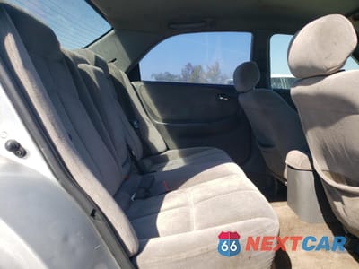 Zdjęcie 10 z 12 samochodu: 2002 MAZDA 626 LX VIN:1YVGF22C125296145 - miniatura