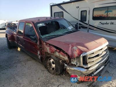 Czwarte zdjęcie samochodu z boku: 2002 FORD F350 SUPER DUTY VIN:1FTWW32F52EA95737 - miniatura