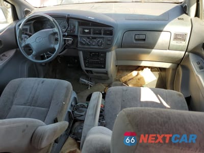 Zdjęcie 8 z 13 samochodu: 1998 TOYOTA SIENNA LE VIN:4T3ZF13C6WU021800 - miniatura